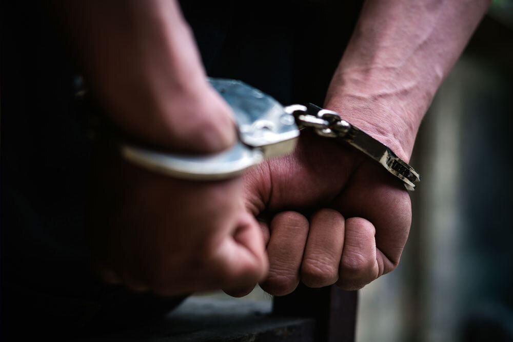 Hands in handcuffs